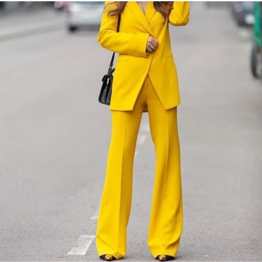 Zara Elegant Textured Flare pants in yellow.